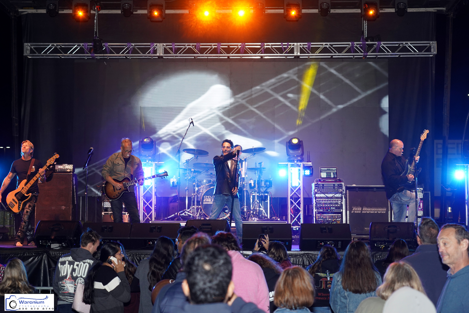 7th Heaven full band performing for festival crowd